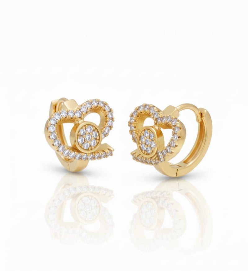 A delicate gold-plated hoop featuring a twisted heart design studded with dazzling white zircon stones. A shiny circular shape in the center adds an elegant touch. - Image 1
