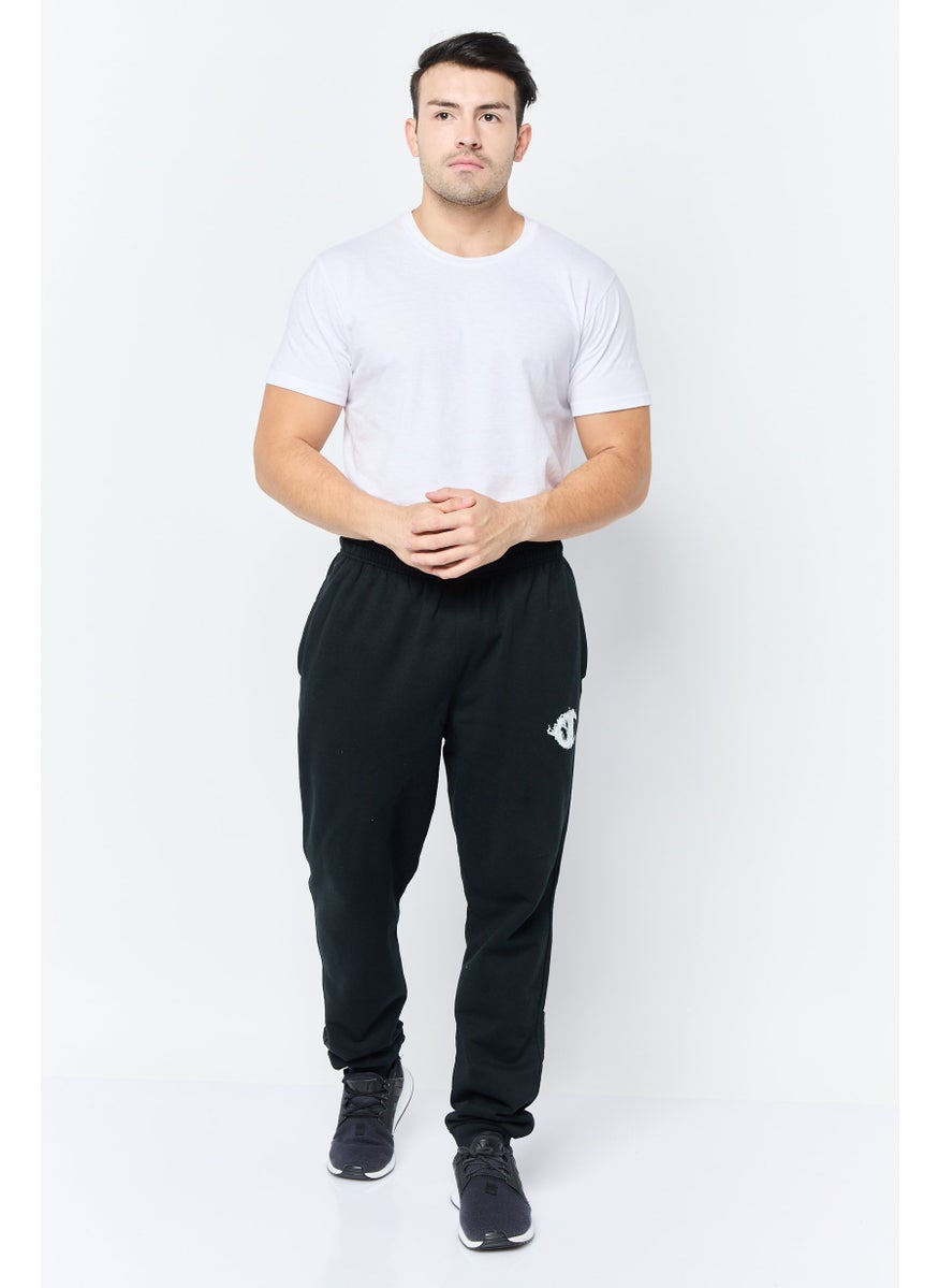 Champion - Men Sportswear Fit Graphic Print Outdoor Sweatpants, Black - Image 1