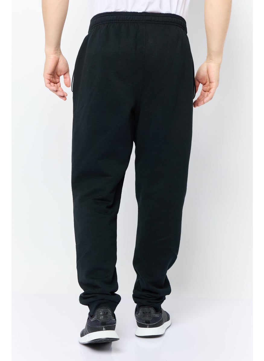 Champion - Men Sportswear Fit Graphic Print Outdoor Sweatpants, Black - Image 1