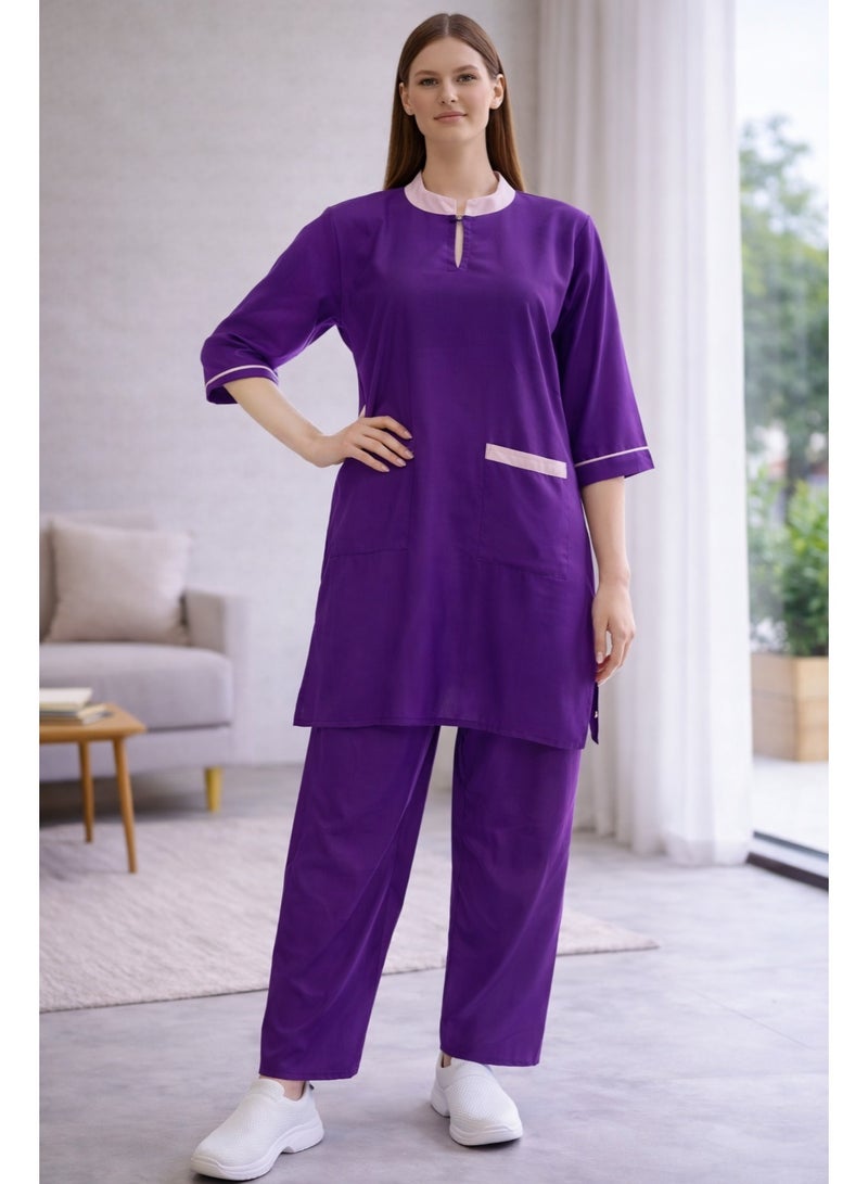 زي عمل باللون البنفسجي المحدد بالابيض