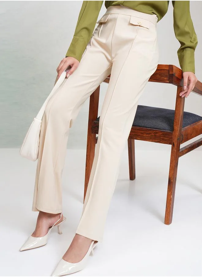 طوكيو توكيز Solid Mid Rise Flared Trousers