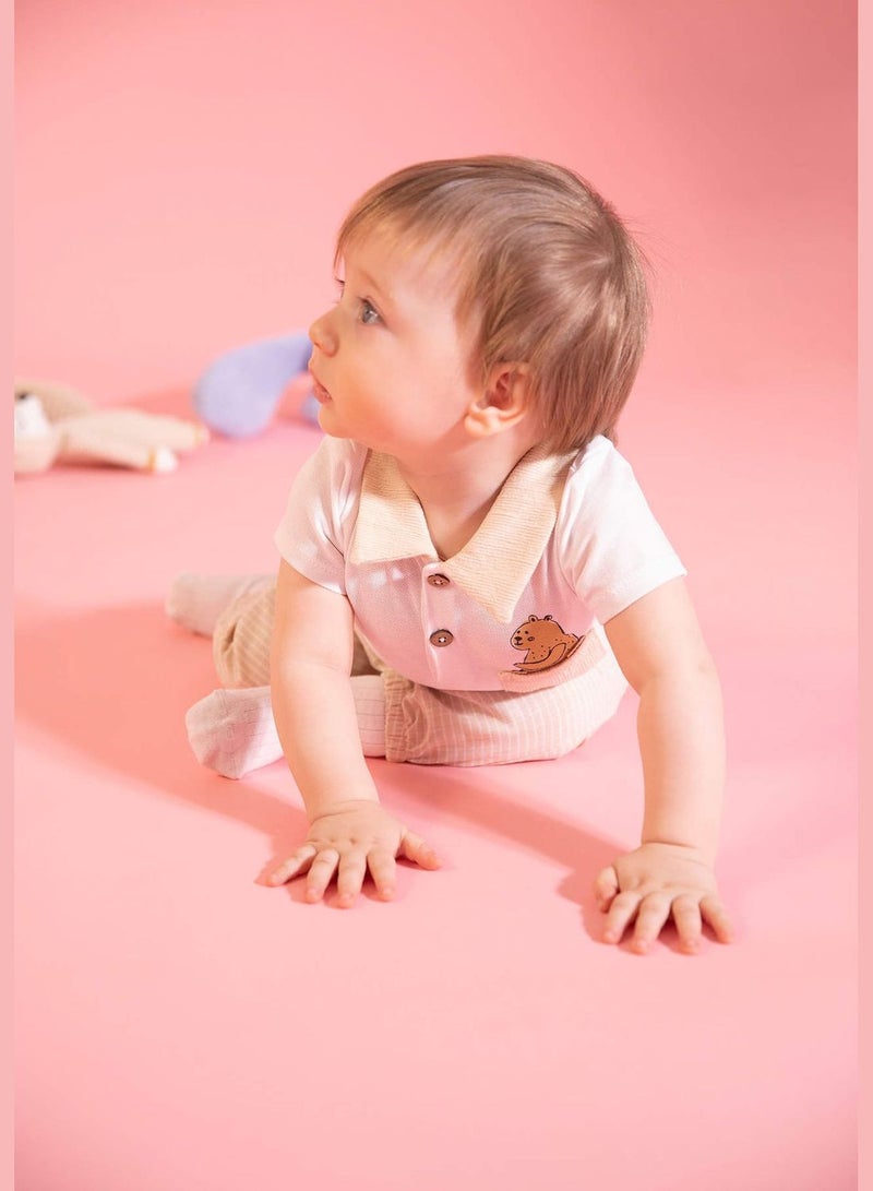 ديفاكتو بودي سوت مطبوع بأكمام قصيرة للمواليد - Image 2