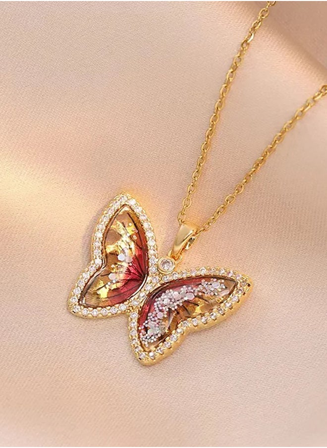 The Black Pearl Accessories - Stainless Steel Necklace Golden with a Zirconic Red Obal Butterfly Pendant - Image 1