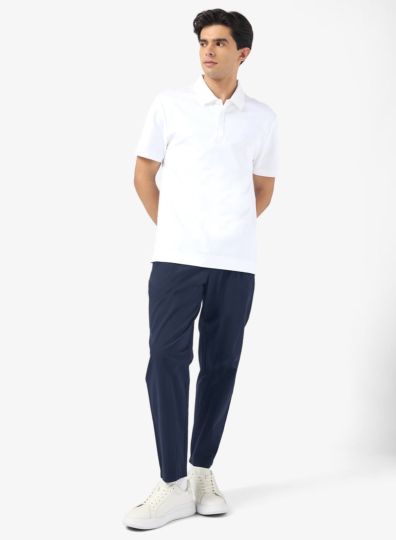 كالفن كلاين قميص بولو بأكمام قصيرة من قماش الإنترلوك - Image 4