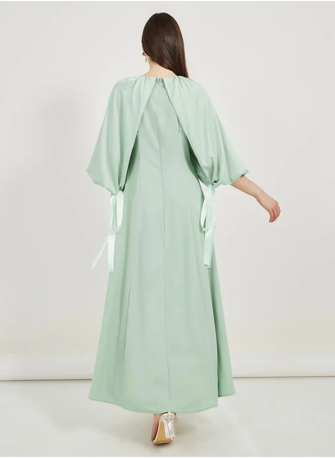Styli Bow Tie Detail Cape Sleeve A-Line Maxi Dress