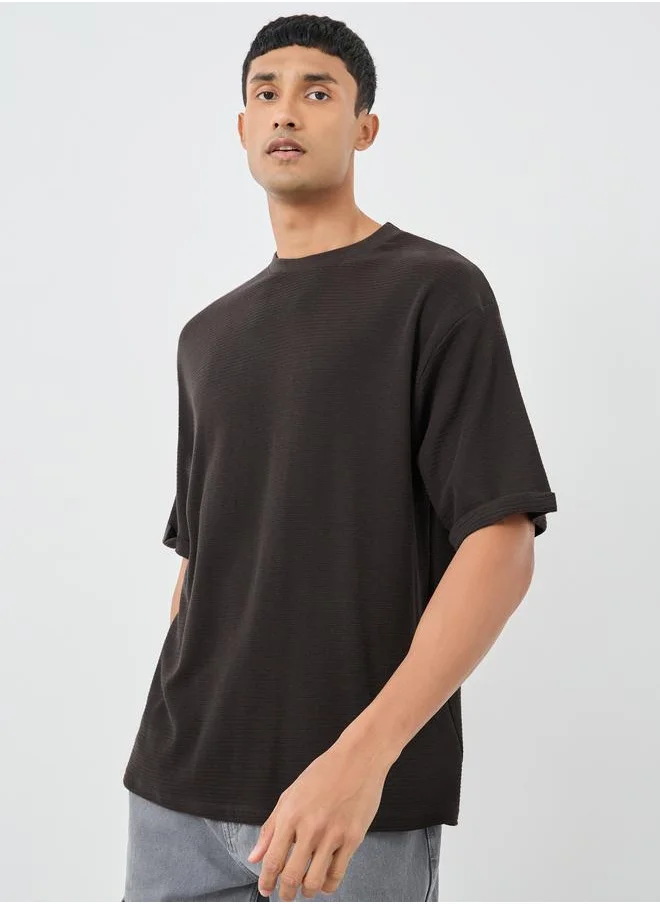 ستايلي Styli Waffle Knit Oversized T-Shirt with Turn-Up Sleeves