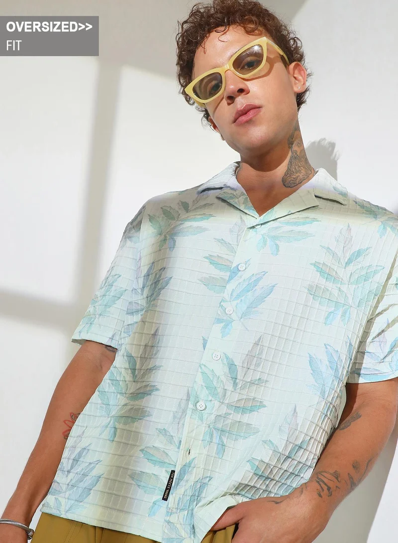 Campus Sutra Campus Sutra Men's Ivory White Faded Foliage Oversized Shirt For Casual Wear | Cuban Collar | Short Sleeve | Button Closure | Oversized Shirt Crafted With Comfort Fit For Everyday Wear