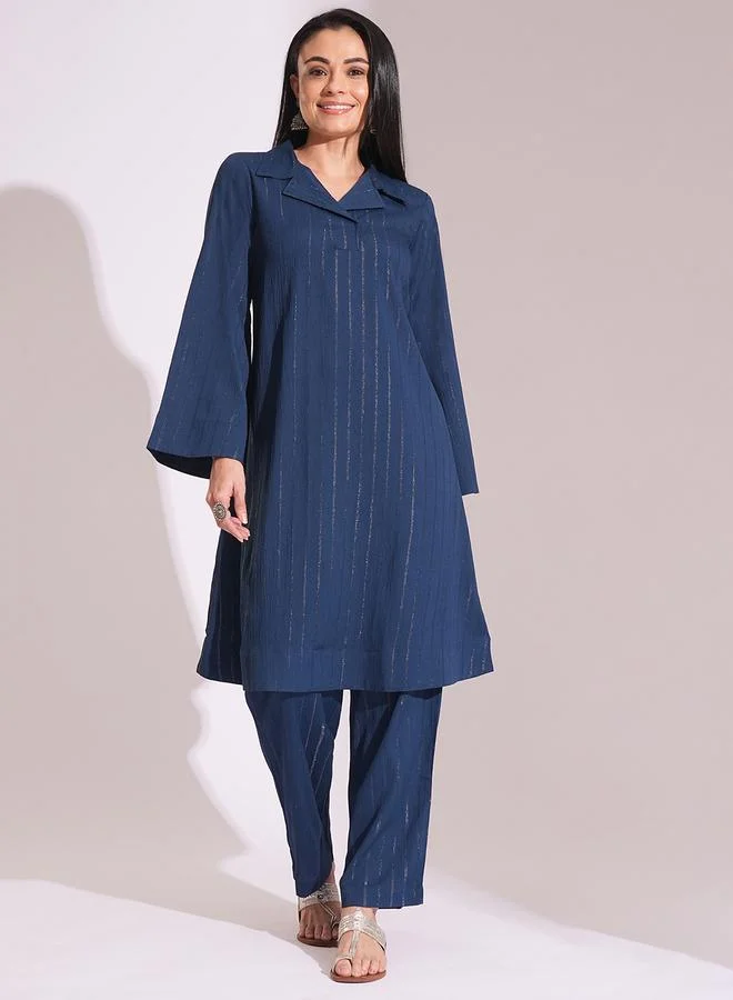 جلو باص طقم من بنطال وكورتا بتفاصيل لامعة