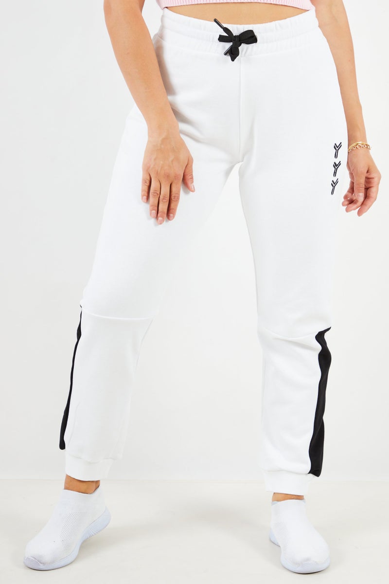 JOHN RICHMOND سروال جوجر رياضي نسائي من فليس، أبيض بصري - Image 1