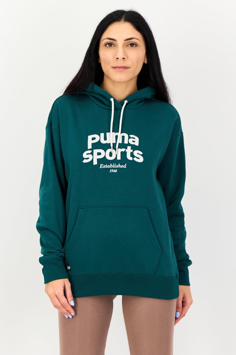 PUMA Women Relaxed Fit Long Sleeve Outdoor Hoodie, Green - Image 1