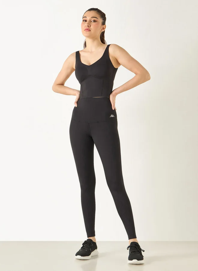 كابا بنطلون ليقنز بخصر مطّاطي وطبعات شعار من كابا