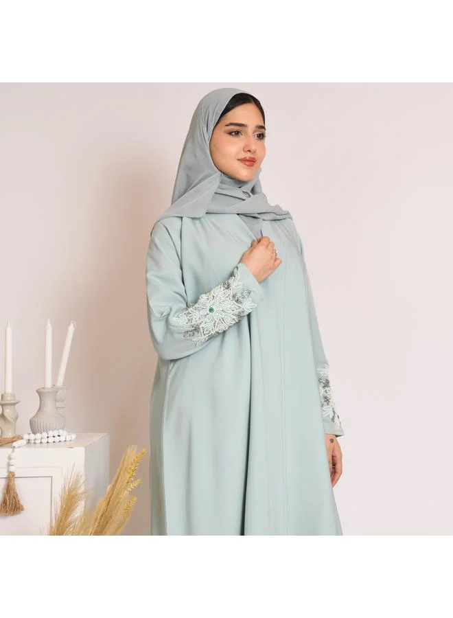 HAWRAA ABAYA Tiffany-colored quarter-cloche wrap abaya with hand embroidery on the sleeves