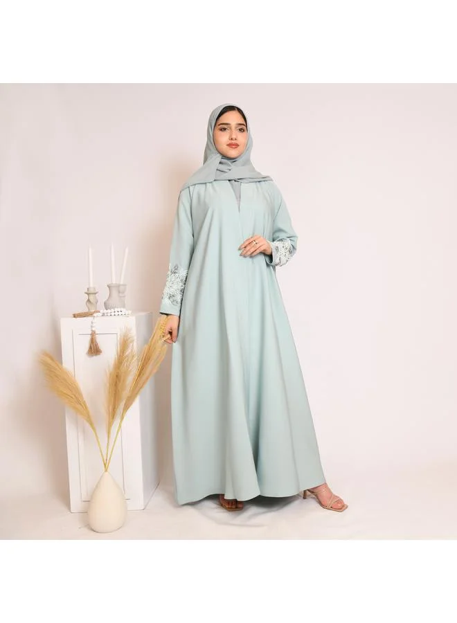 HAWRAA ABAYA Tiffany-colored quarter-cloche wrap abaya with hand embroidery on the sleeves