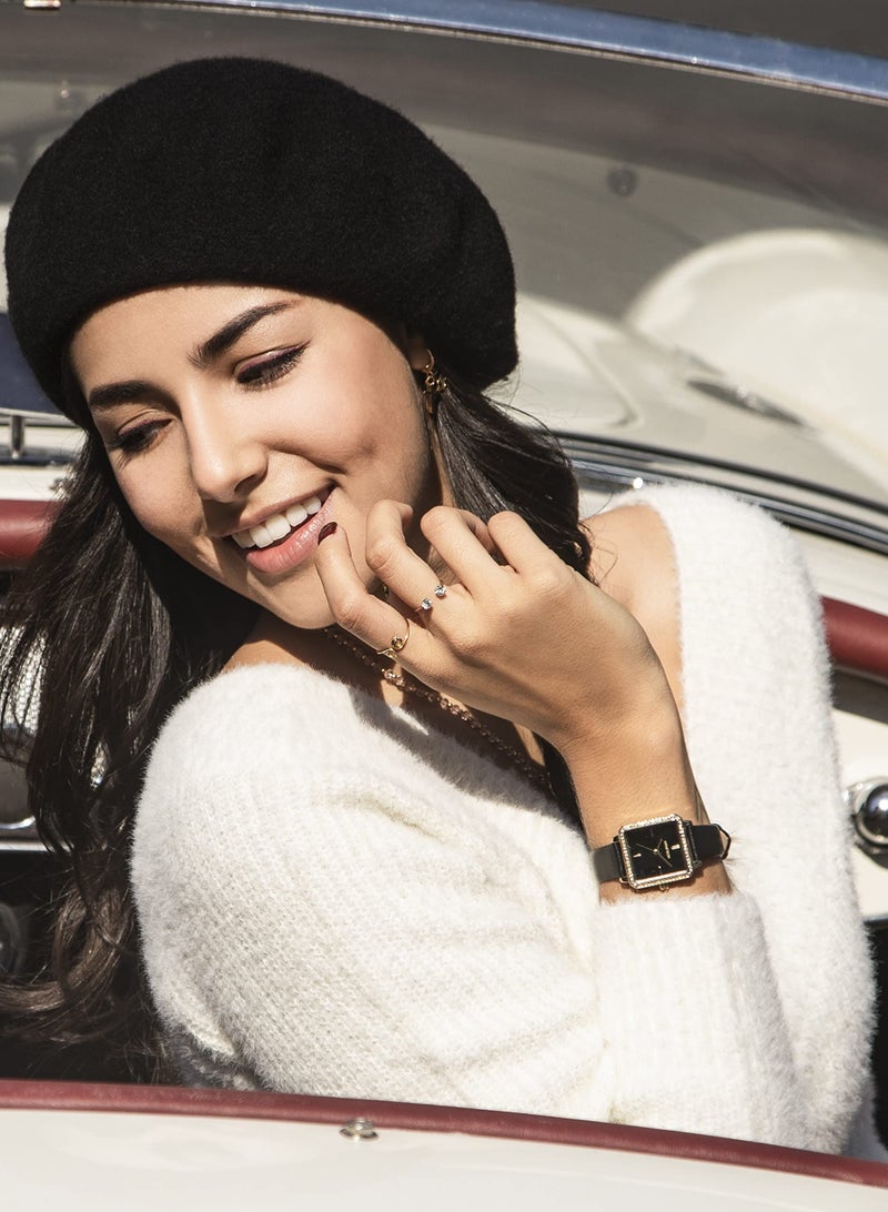 Armitron ساعة أرمترون للنساء 75/5597BKGPBK مزينة بالكريستال الأصلي بحزام جلدي أسود وبلون الذهب - Image 1