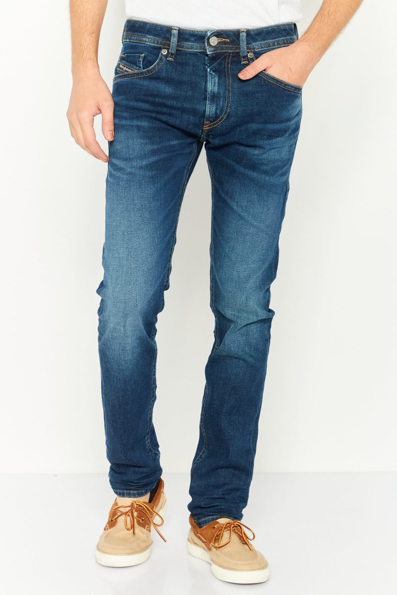 DIESEL جينز ضيق للرجال بتصميم مريح، لون أزرق مائل للصبغة - Image 1