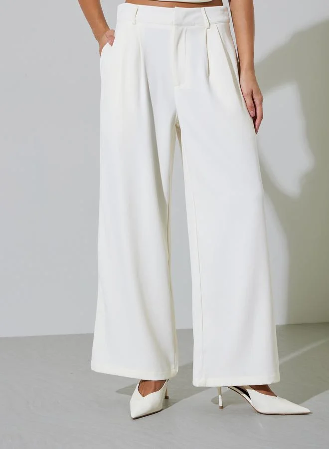 ستايلي Off White Solid Pleated Wide Leg Pants