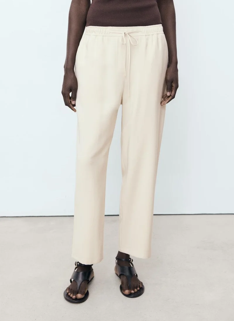 مانجو High Waist Wide Leg Trousers