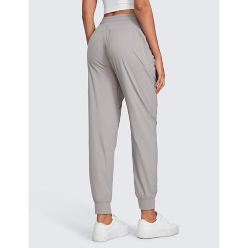 Women's high-waisted joggers for workout studio and casual outdoor use, lightweight polyester-spandex blend, black, ruched design with functional pockets - Image 3