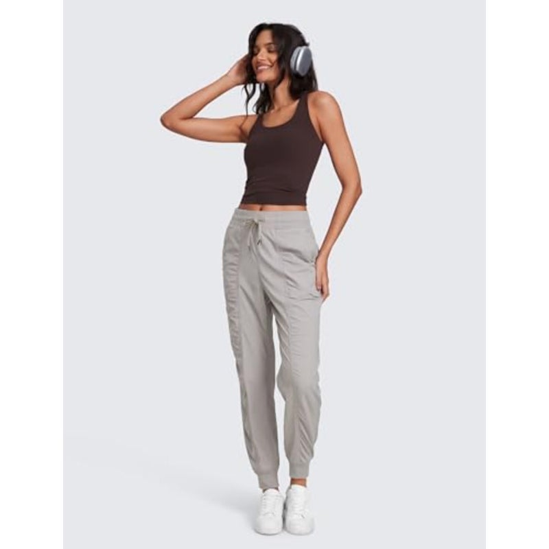 Women's high-waisted joggers for workout studio and casual outdoor use, lightweight polyester-spandex blend, black, ruched design with functional pockets - Image 2