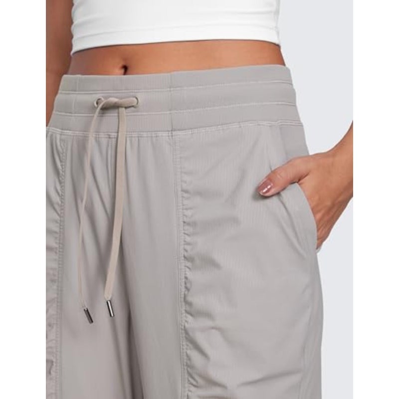 Women's high-waisted joggers for workout studio and casual outdoor use, lightweight polyester-spandex blend, black, ruched design with functional pockets - Image 4