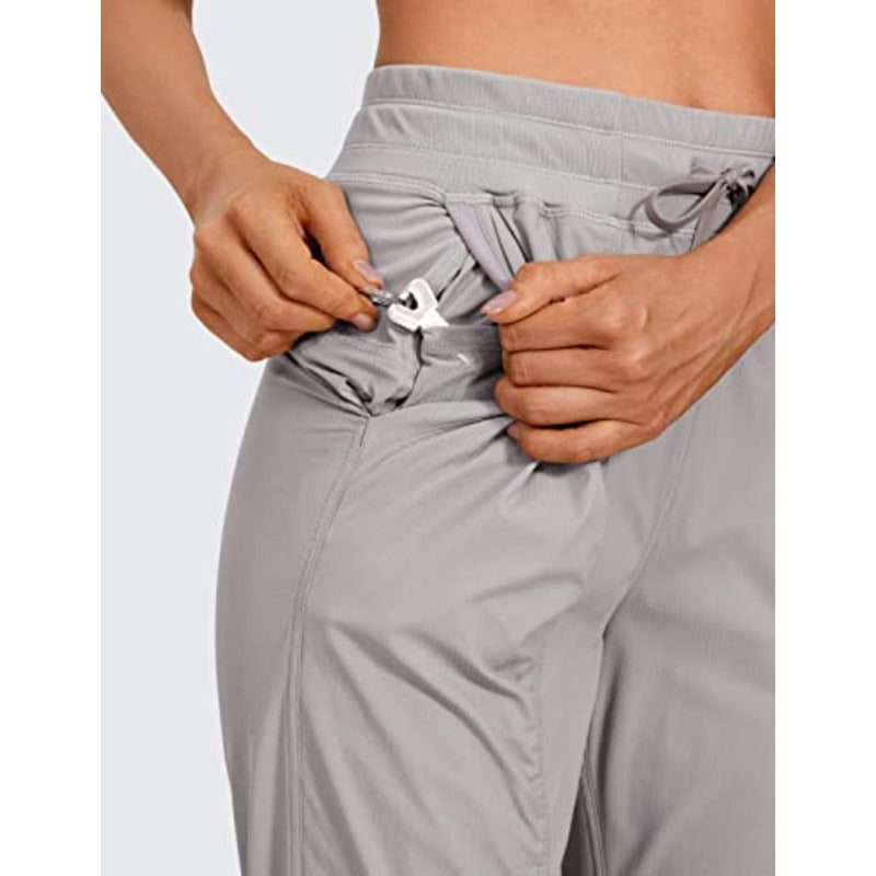 Women's high-waisted joggers for workout studio and casual outdoor use, lightweight polyester-spandex blend, black, ruched design with functional pockets - Image 5