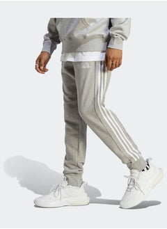 Adidas بنطال رياضي أساسيات فرينش تيري بأساور مدببة بثلاثة خطوط  - Image 1