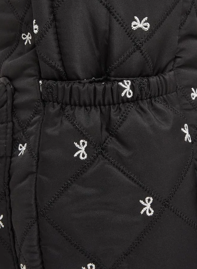 Styli  Women Black Quilted Look Backpack with Bow Detail  | Best Price UAE