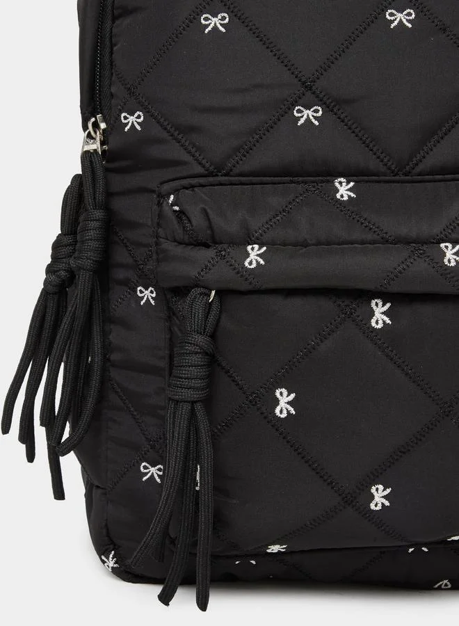 Styli  Women Black Quilted Look Backpack with Bow Detail  | Best Price UAE