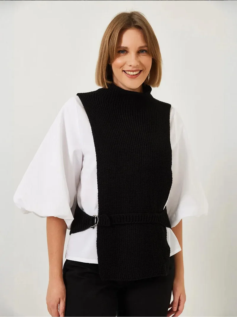 بيانكو لوتشي بلوزة بياقة مدورة مضلعة بنقشة  مع فيونكة