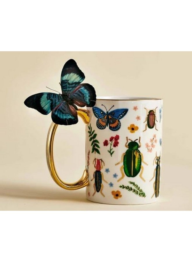 رايفل بيبر كو. كوب كوريو من البورسلين من شركة رايفل بيبر - كوب بورسلين سعة 16 أونصة، مزين برسومات ملونة بالكامل مع لمسات ذهبية معدنية، 4.5 بوصة طول × 3.125 بوصة عرض، تصميمات طبيعية معقدة مع حافة ومقبض مطليين بالذهب - Image 4