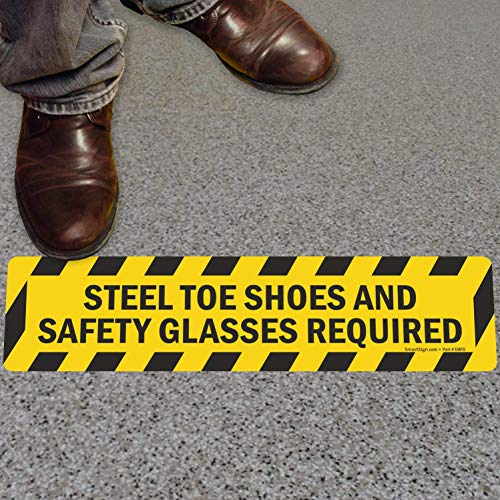 SmartSign - SF-0239-FO-24 "Steel Toe Shoes And Safety Glasses Required" Anti Slip Adhesive Floor Sign | 6" x 24" Black on Yellow - Image 1