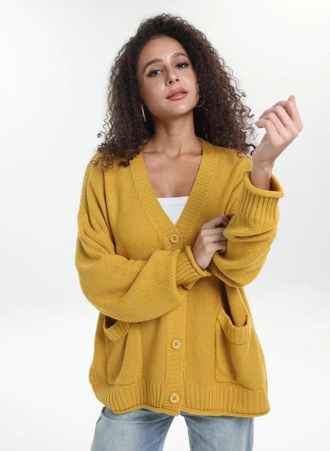 تايك تو كارديجان محبوك بمقاس كبير وتفاصيل بارزة الملمس