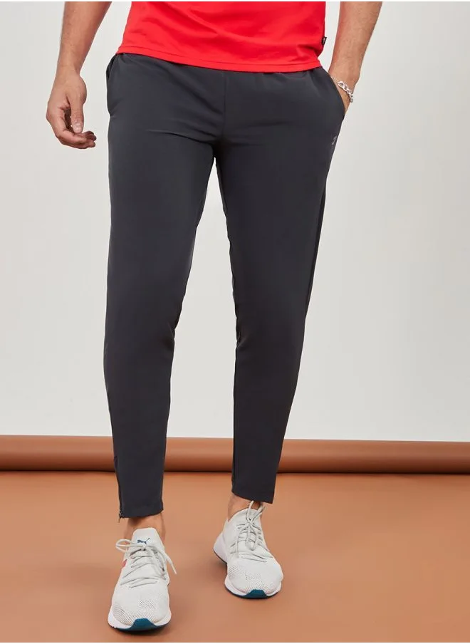 Styli Woven Running Track Pants with Zip Hem