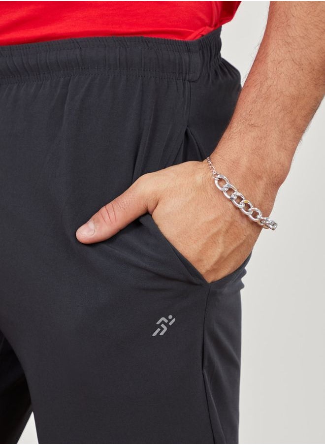 Styli - Woven Running Track Pants with Zip Hem - Image 1