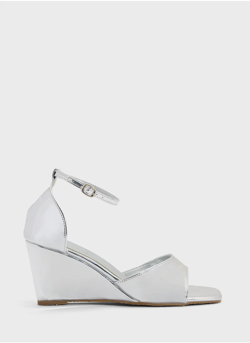 ايلا Mirror Counter Strap Wedge Sandal