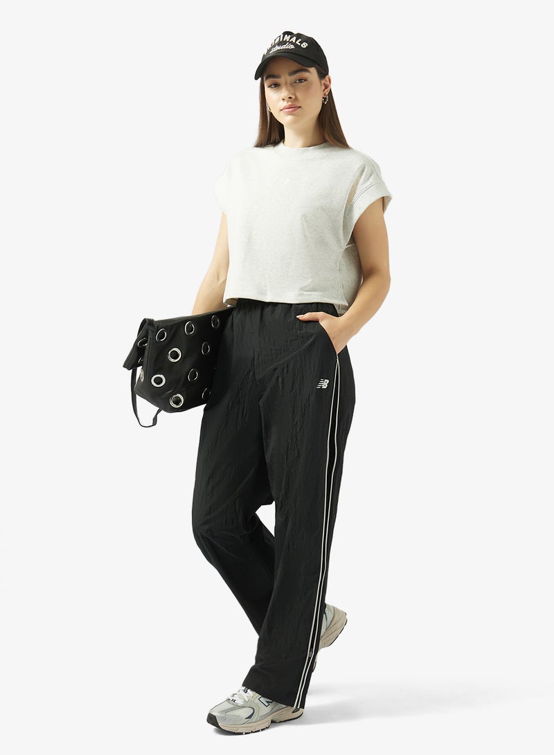 New Balance Essentia Legacy Woven Pants - Image 2