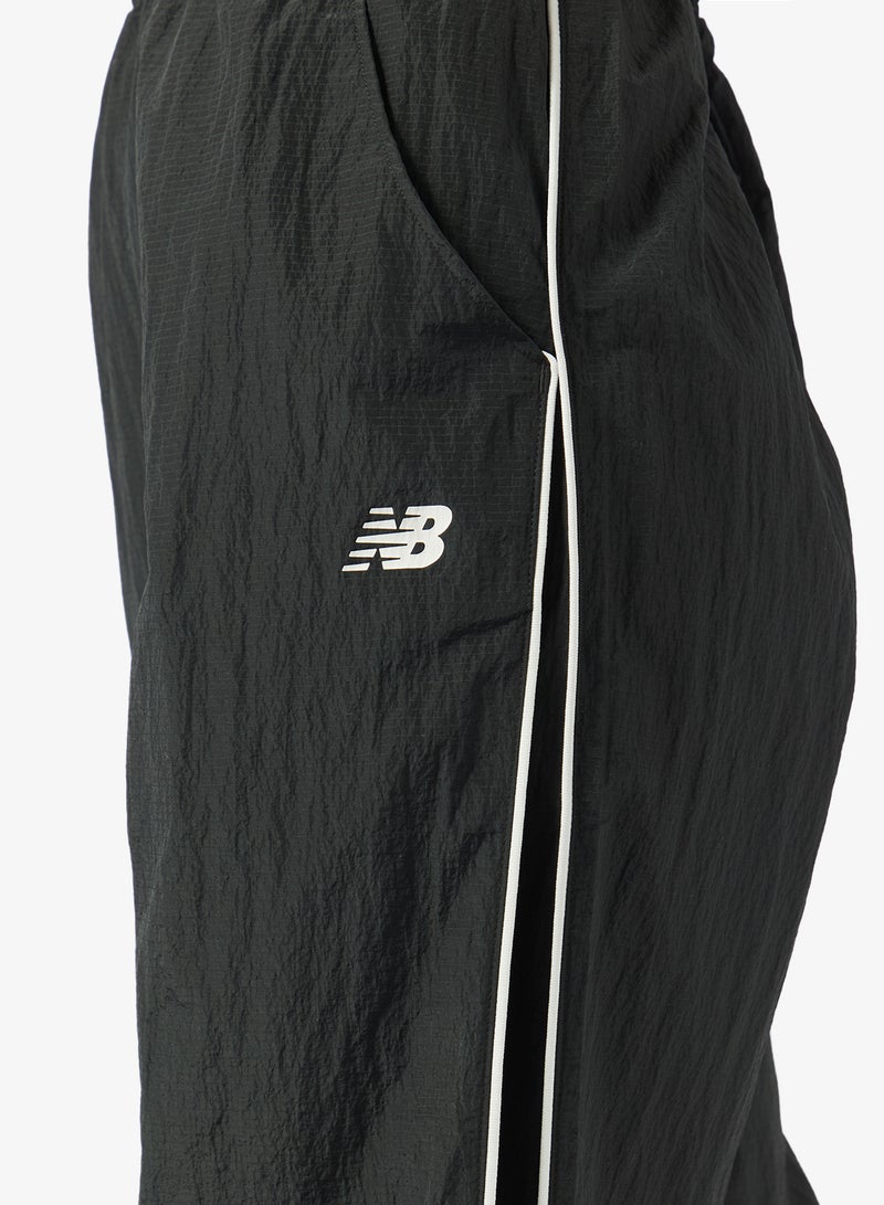 New Balance Essentia Legacy Woven Pants - Image 4