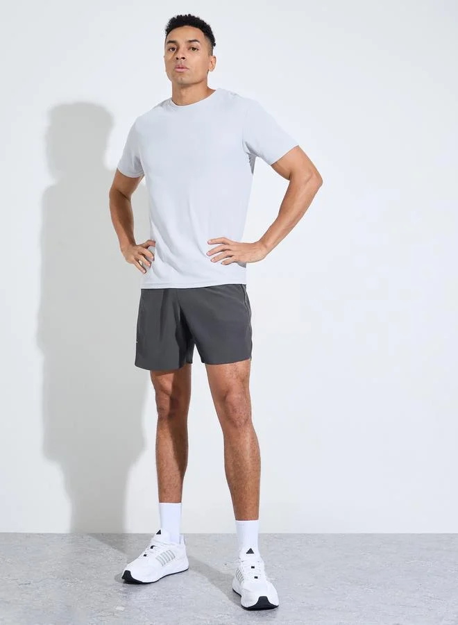 Styli  Grey Solid Side Slit Regular Fit Running Shorts with Zipper Pocket for Men | Best Price UAE