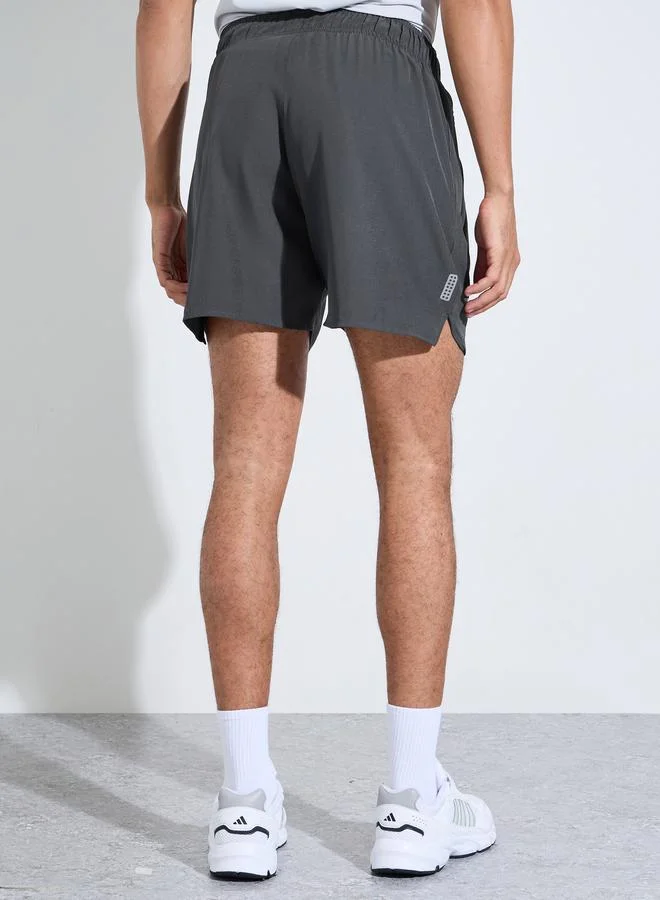 Styli  Grey Solid Side Slit Regular Fit Running Shorts with Zipper Pocket for Men | Best Price UAE