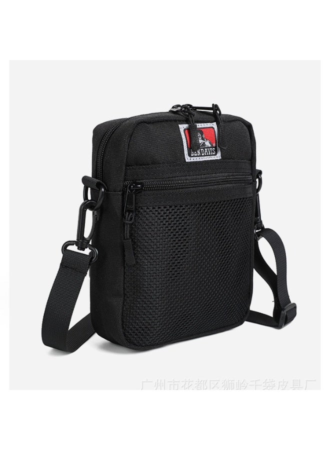 Ben Davis Trendy workwear style black crossbody bag with adjustable wide shoulder strap, perfect for outdoor travel, carrying your ID and phone. - Image 1
