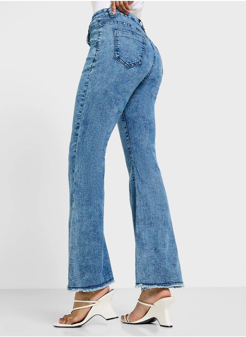 Ginger High Rise Bootcut Fit Jeans With Frayed Hem