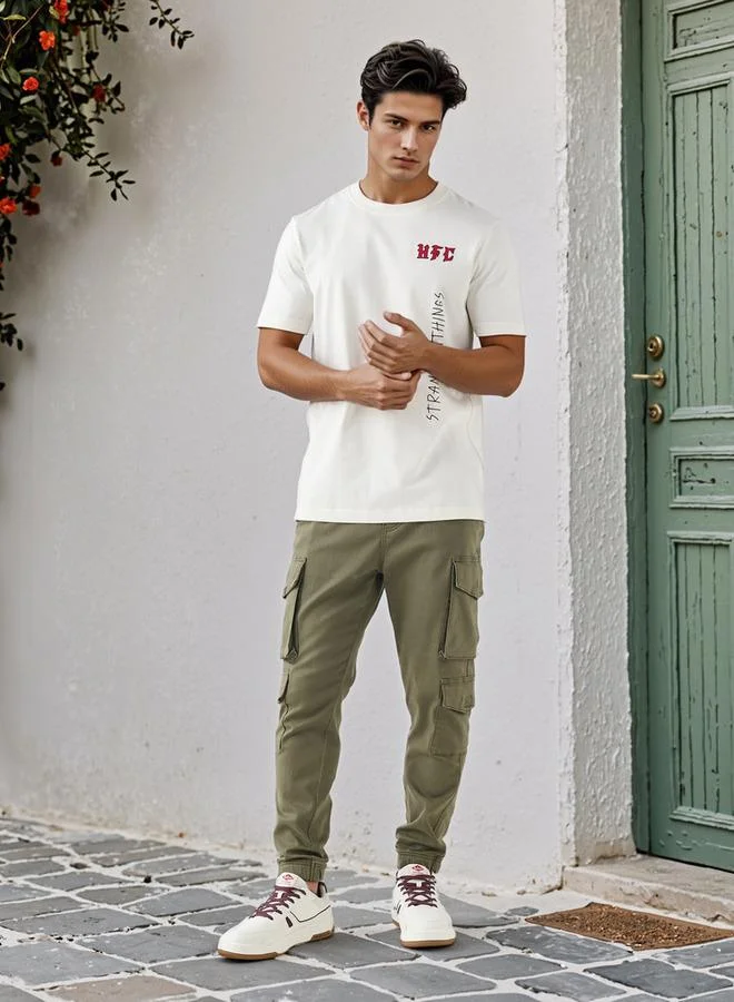 سبلاش فيڤ تيشيرت بياقة دائرية بطبعة سترينجر ثينجز