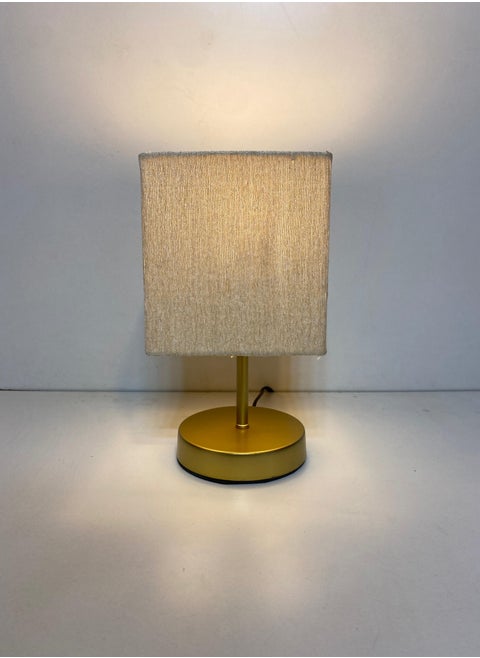 Distinctive And Elegant Table Lamp Shade With A Unique Fabric Shade And Beige Metal