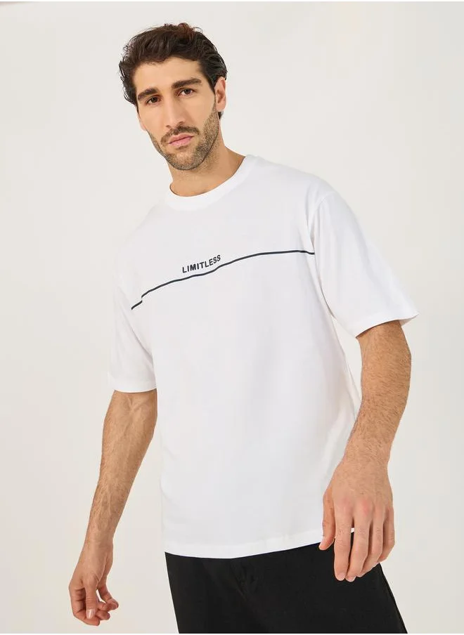 ستايلي Minimal Embossed Print Oversized Cotton T-Shirt