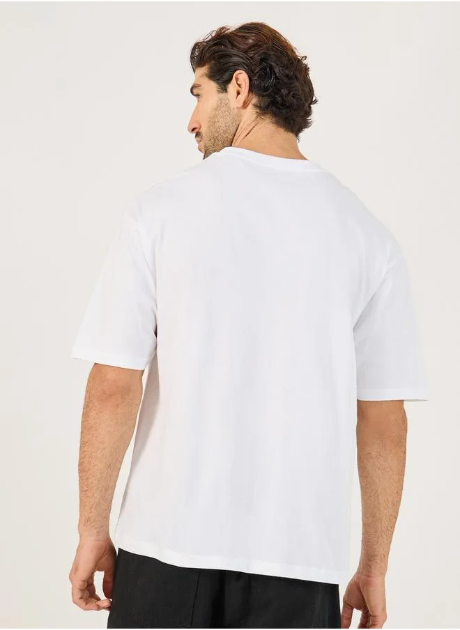 ستايلي Minimal Embossed Print Oversized Cotton T-Shirt