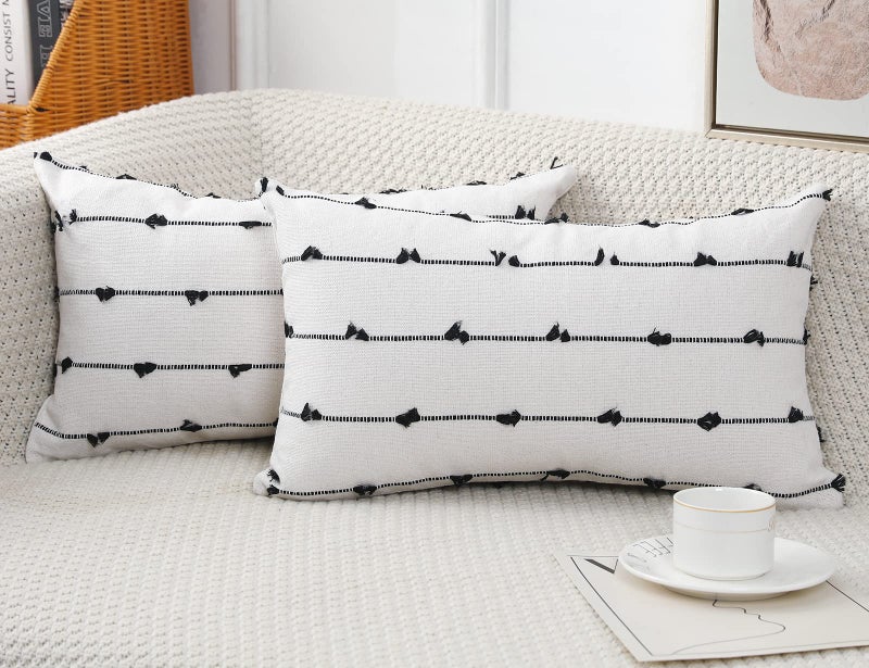 NUYECY Set of 2 Boho Lumbar Throw Pillow Covers 12x20 Black Off White Neutral Couch Pillow Case with Tassel Fringe Decorative Modern Accent Farmhouse Cushion Covers for Sofa Couch Bed Living Room - Image 1