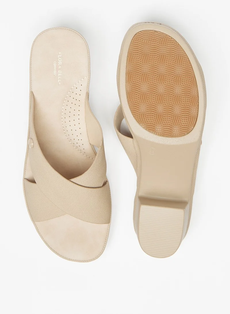 فلورا بيلا من شو إكسبرس Womens Textured Slip-On Cross Strap Sandals with Block Heels