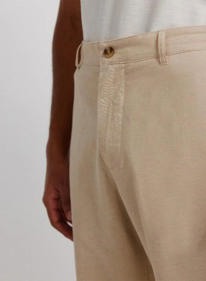 Springfield  Linen/cotton trousers with side seam pockets. It has an elasticated waistband at the back and an internal drawstring for a better fit. Back welt pockets. Straight fit. for Men | Best Price UAE