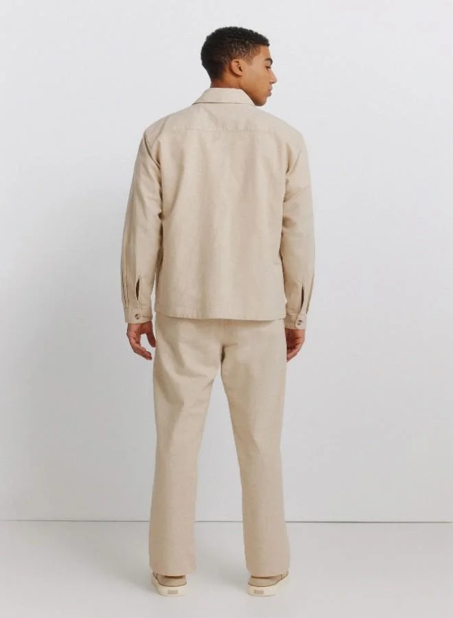 Springfield  Linen/cotton trousers with side seam pockets. It has an elasticated waistband at the back and an internal drawstring for a better fit. Back welt pockets. Straight fit. for Men | Best Price UAE