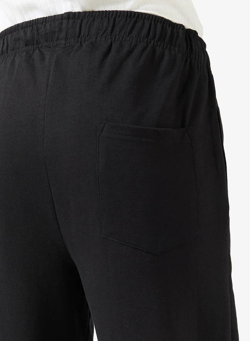 سفنتي فايف بنطلون رياضي مطرز بالجانب